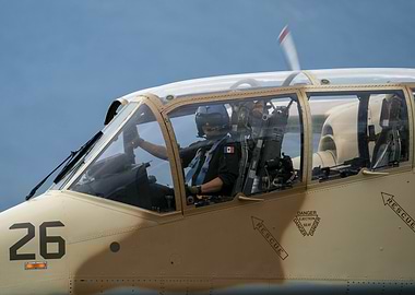 Pilot in cockpit of military plane
