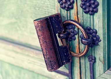 Antique Lock on Green Wooden Door