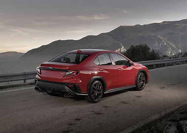 Red Subaru WRX on Mountain Road