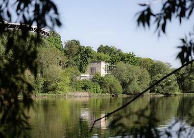 Lake view with building and trees