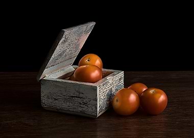 Tomatoes in a decorative wooden box