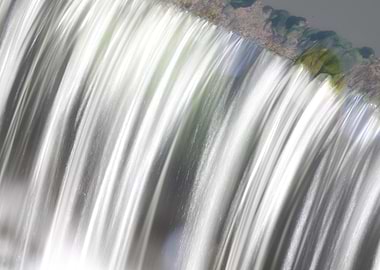 Water cascading over a stone edge