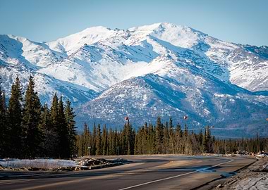 Snowy Mountains and Road Landscape