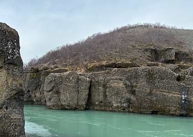 River Through Rocky Landscape