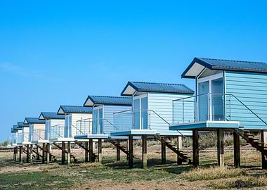 Beach huts under blue sky