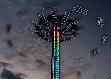 Colorful Spinning Ride at Dusk