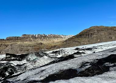 Glacier landscape with mountains and blue sky