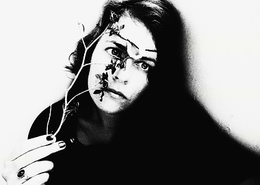 Monochrome Portrait with Floral Accent