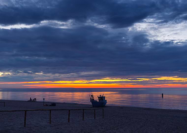 Sunset over the sea with boat, Baltic Sea