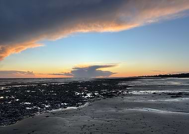 Sunset over a rocky beach