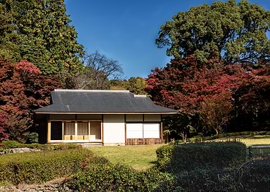 Japanese House in Autumn Landscape