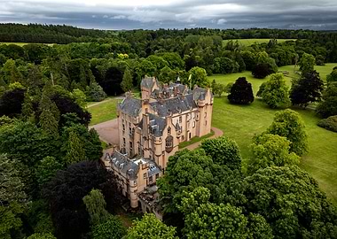 Castle surrounded by lush green trees
