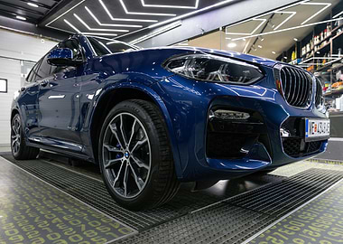 Blue BMW X3 close-up shot