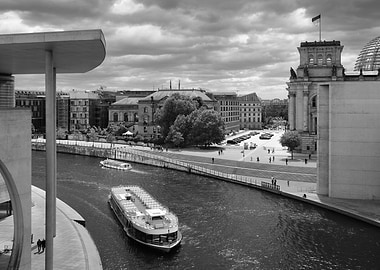 Berlin cityscape with river and boats