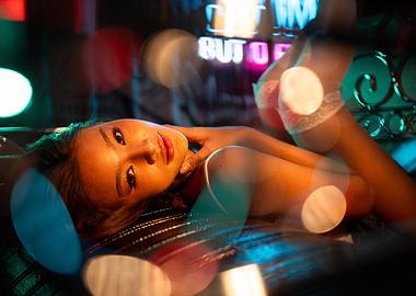 Woman Lying Down with Bokeh Lights