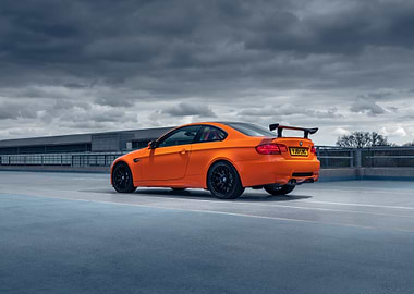 Orange BMW M3 on Rooftop