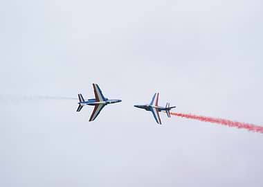 Two Airplanes Performing Aerobatics