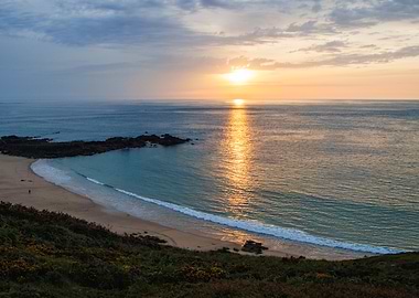 Sunset Over Tranquil Beach Cove