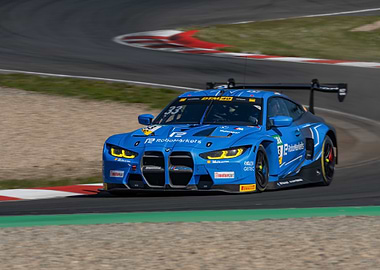 Blue Race Car on Track