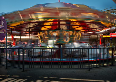Carousel in Motion at Amusement Park