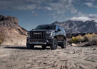 Black GMC Yukon in Desert Landscape