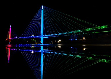 Colorful Bridge at Night with Reflection