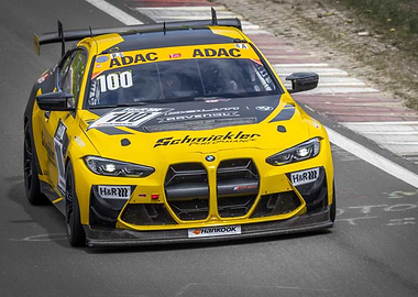 Yellow BMW Race Car on Track