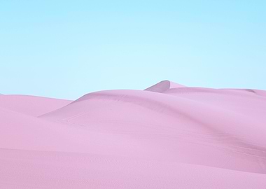 Pink Sand Dunes Under Blue Sky