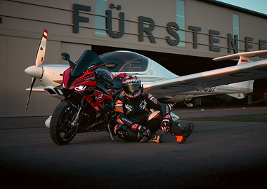 Motorcycle and Plane at Airport