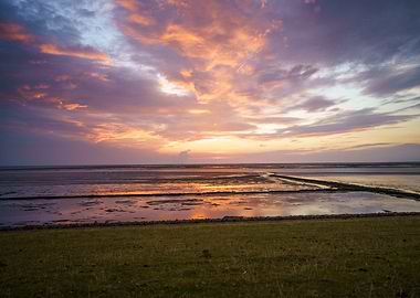 Clouds illuminated by the sunset - Pellworm, Wadden sea, Germany