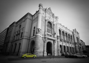 Vigado Concert Hall with yellow taxi