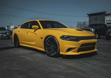 Yellow Dodge Charger parked outdoors