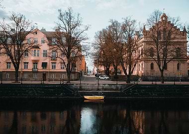 Cityscape with River and Buildings