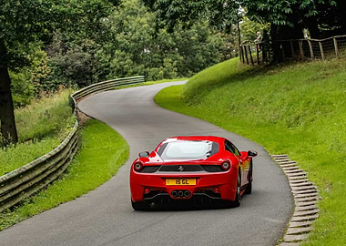 Red Ferrari on winding road