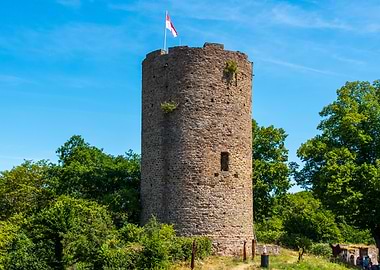 Stone Tower with Flag and Trees