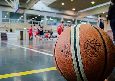 Basketball game in indoor court