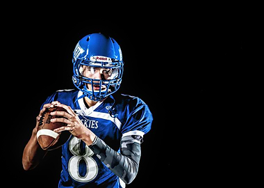 Football Player in Blue Uniform