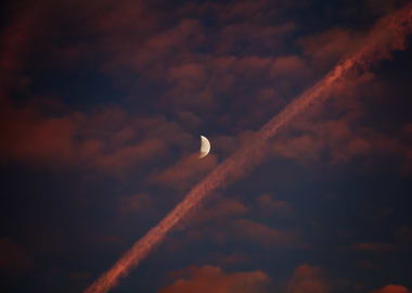 Crescent Moon with Contrail