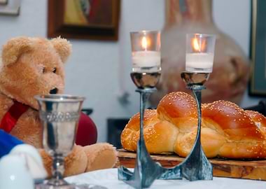 Shabbat Table with Teddy Bear