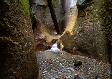 Sombio Beach stream with rock formations
