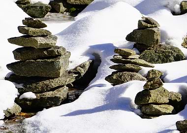 Stone Cairns in Winter Landscape