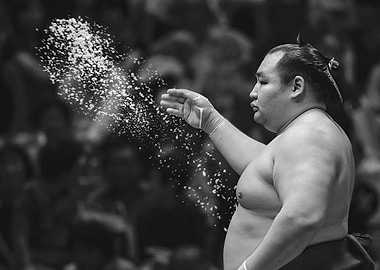 Sumo wrestler throwing salt