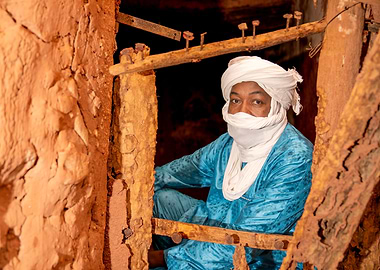 Man in Turban in Mud Structure