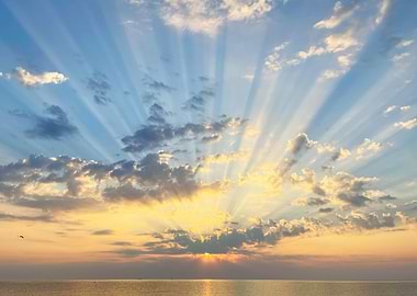 Radiant Sunrise Over Calm Sea