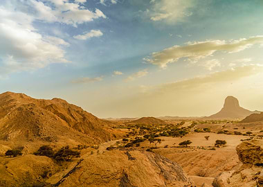 Desert Landscape with Mountains and Sky