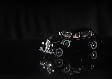 Black Vintage Car on Reflective Surface
