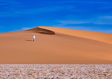 Desert Wanderer Under Blue Sky