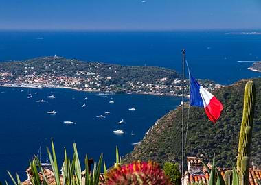 French Riviera Coastline with Flag