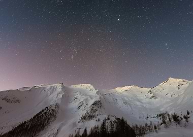 Snowy Mountains Under Starry Night Sky