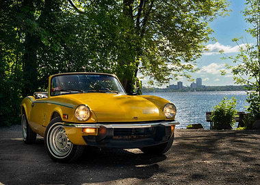 Yellow Convertible Car by the Lake (TRIUMPH SPITFIRE)